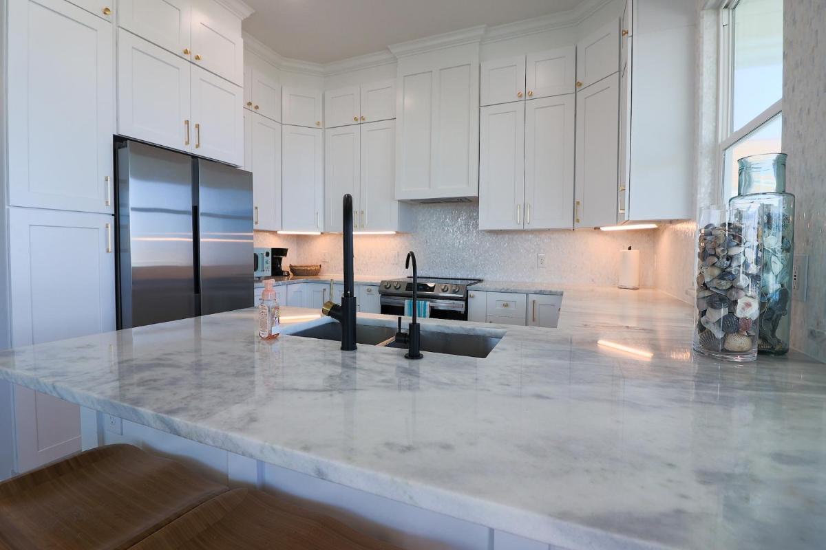 Hot Tub Gulf Views Fireplace BRAND NEW Beach Home in Treasure Island - Housity