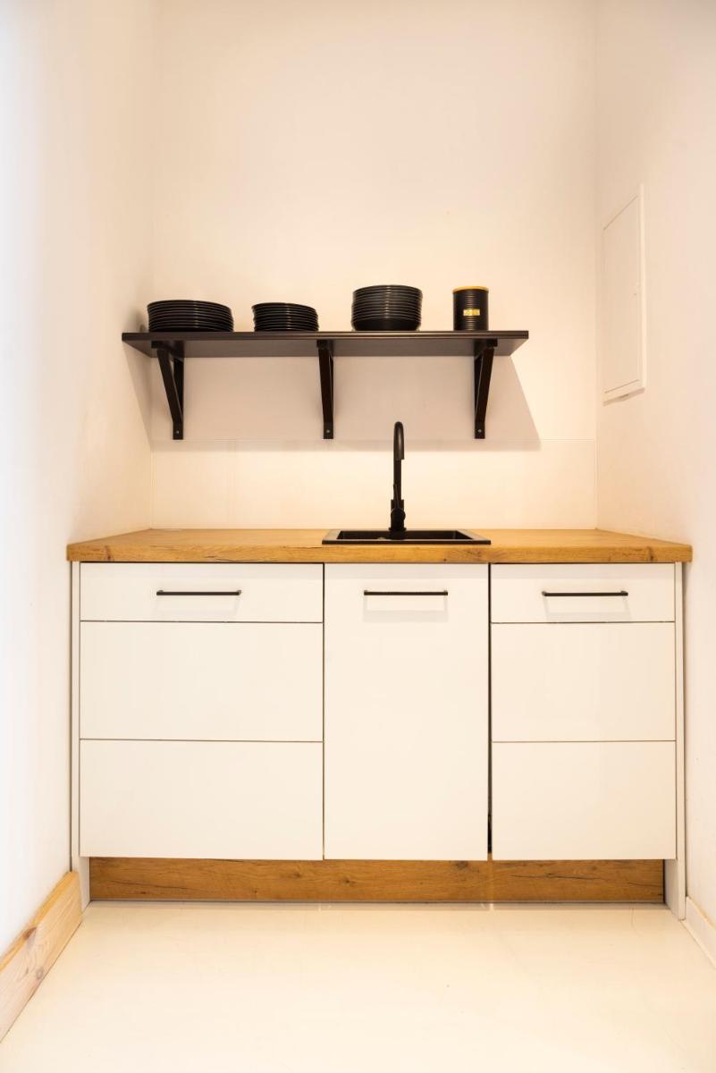 Modernes Loft mit Sandstein-Gewölbe im Zentrum - Housity