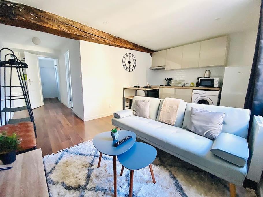 Aux pieds du Vieux-Mans : T2 style industriel 24h - Housity