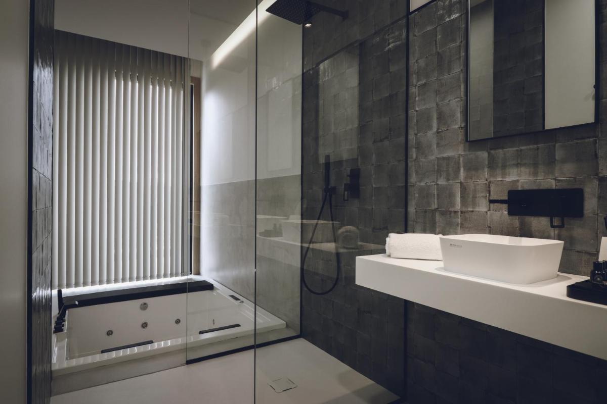 Atmos Hotel Boutique - Housity