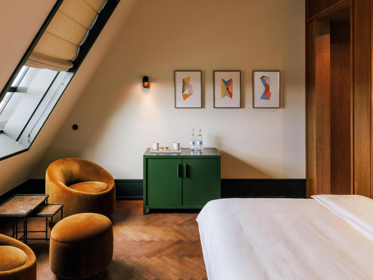Ein Bett oder Betten in einem Zimmer der Unterkunft Boutique Hotel Château Royal Ein Bett oder Betten in einem Zimmer der Unterkunft Boutique Hotel Château Royal