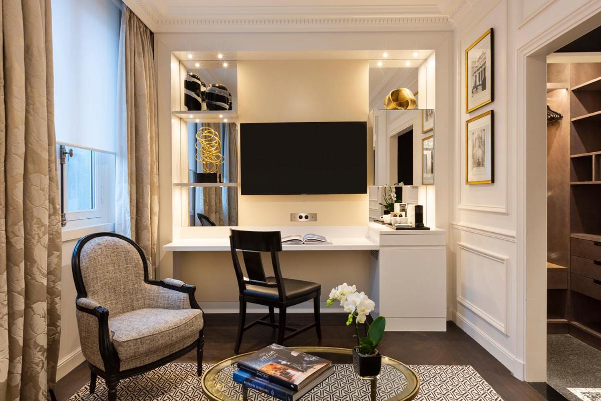 Télévision ou salle de divertissement dans l'établissement Hôtel Keppler