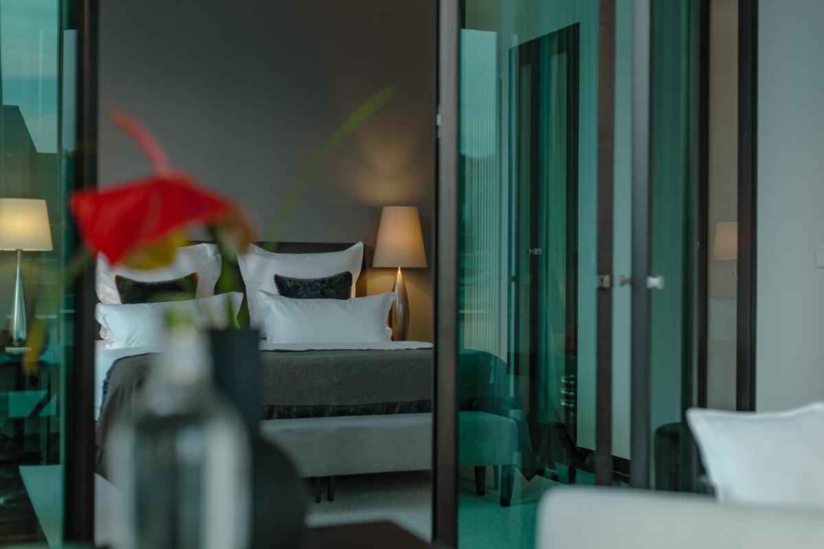 Ein Bett oder Betten in einem Zimmer der Unterkunft A-ROSA Hotel Ceres am Meer - Adults Only