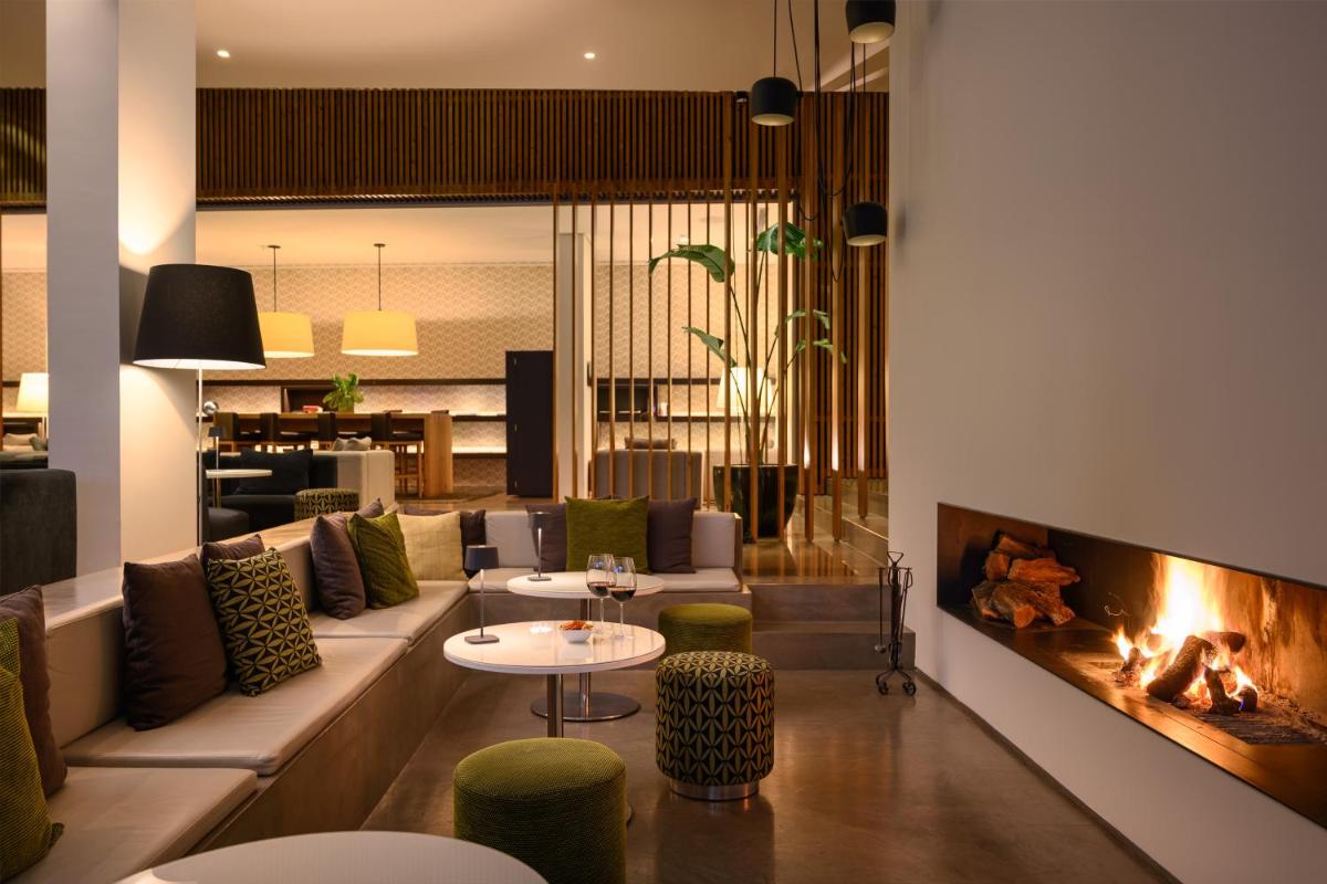 Uma área de estar em Inspira Liberdade Boutique Hotel