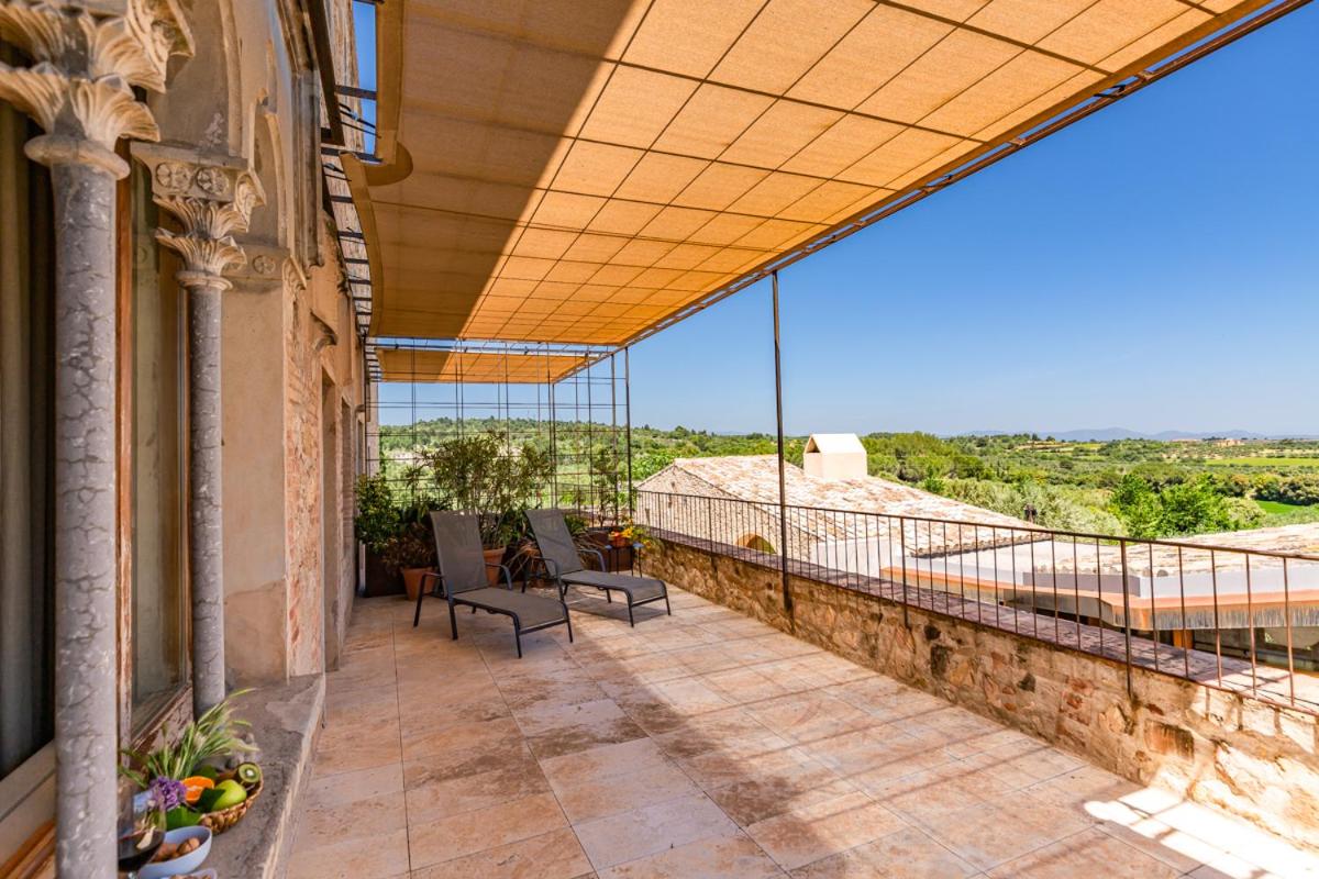 Un balcón o terraza de Hotel Mas Bosch 1526