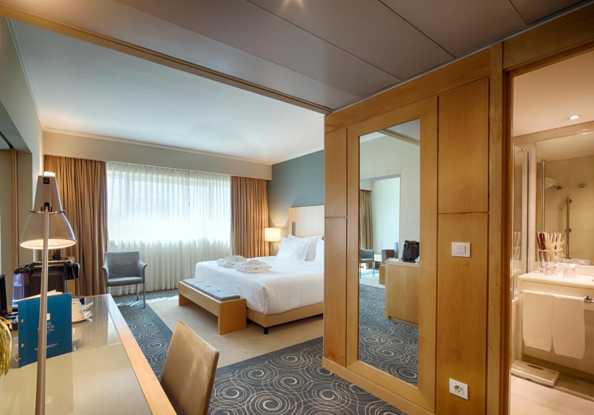 Uma cama ou camas num quarto em SANA Malhoa Hotel