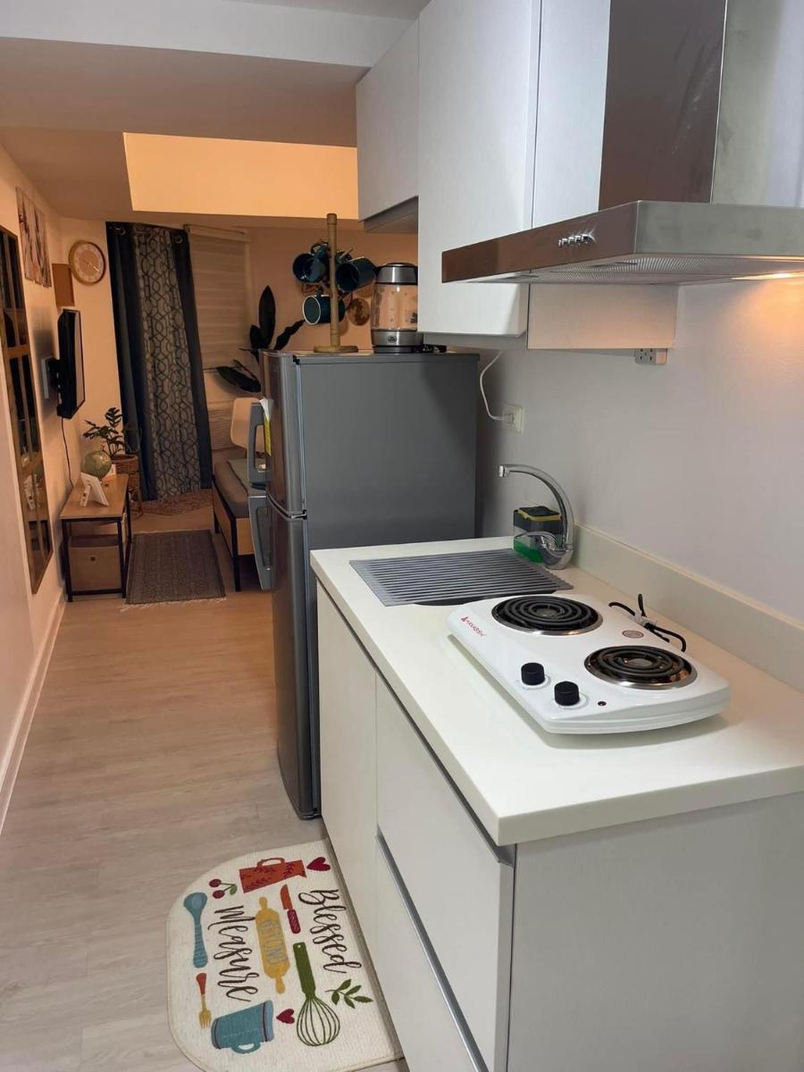Cozy Studio Unit at Azure North San Fernando Pampanga - Housity