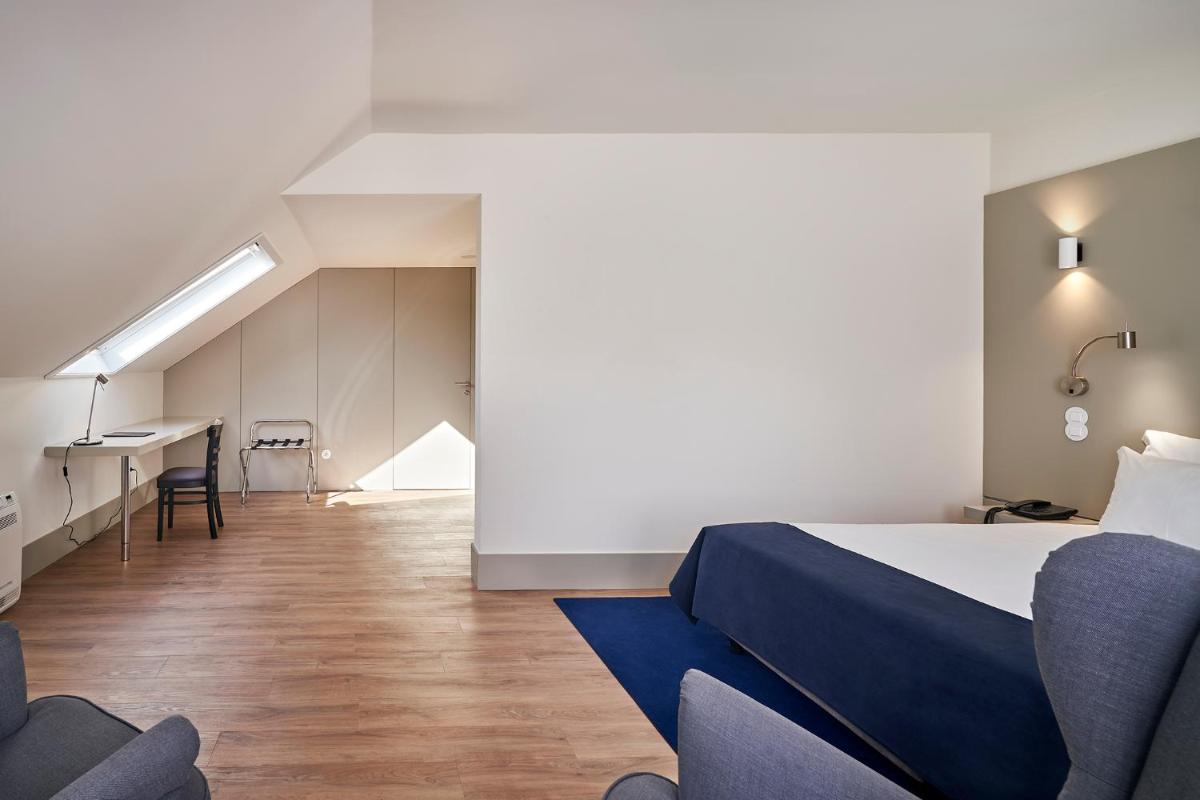 Uma área de estar em Ribeira Collection Hotel by Piamonte Hotels