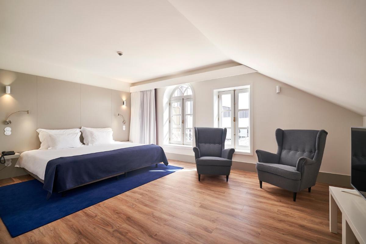 Uma cama ou camas num quarto em Ribeira Collection Hotel by Piamonte Hotels