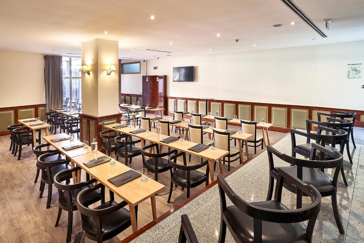 Um restaurante ou outro lugar para comer em Ribeira Collection Hotel by Piamonte Hotels