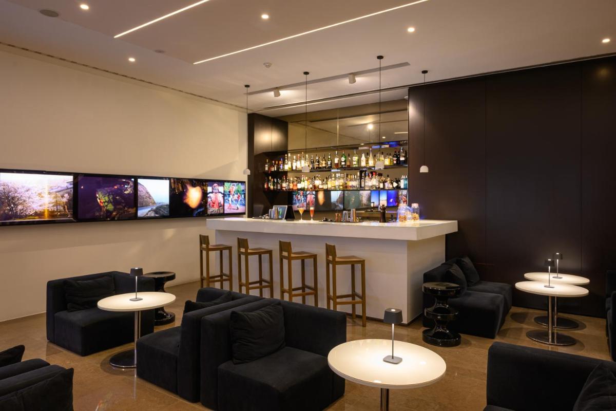 A área de bar ou lounge em Inspira Liberdade Boutique Hotel