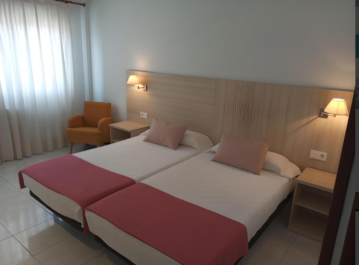 Cama o camas de una habitación en Hotel San Millán
