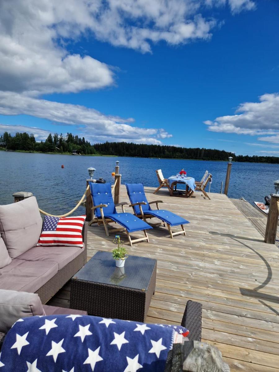 Timber house with private beach and boat including. - Housity