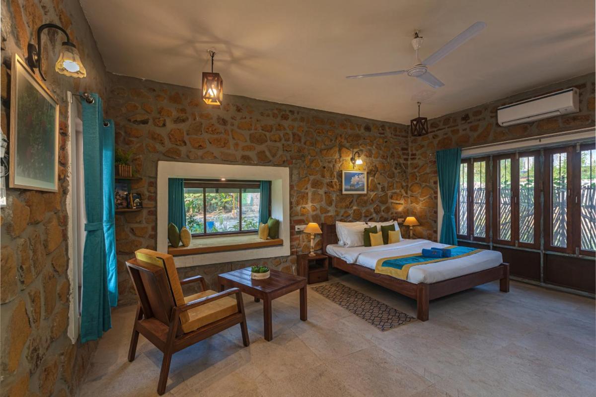 SaffronStays Lake House Bouganvillea, Nashik - rustic pool villa with great lake views and patio dining - Housity