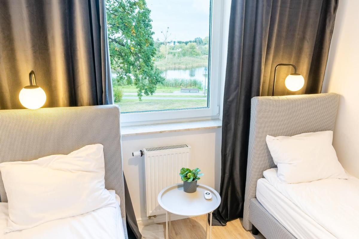 River View - widok na wodę, parking w hali, 3pok i 5 łóżek, klima, Netflix i Max, centrum - Housity