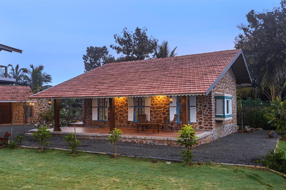 SaffronStays Lake House Marigold, Nashik - rustic cottages with private plunge pool - Housity