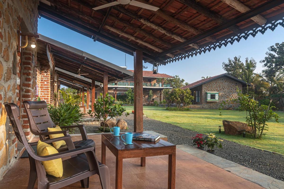 SaffronStays Lake House Dahlia, Nashik - rustic cottages with private plunge pool - Housity