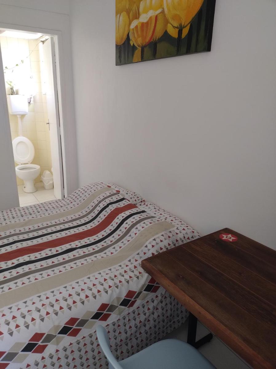 Suíte em apartamento compartilhado, com vista para o mar - Housity