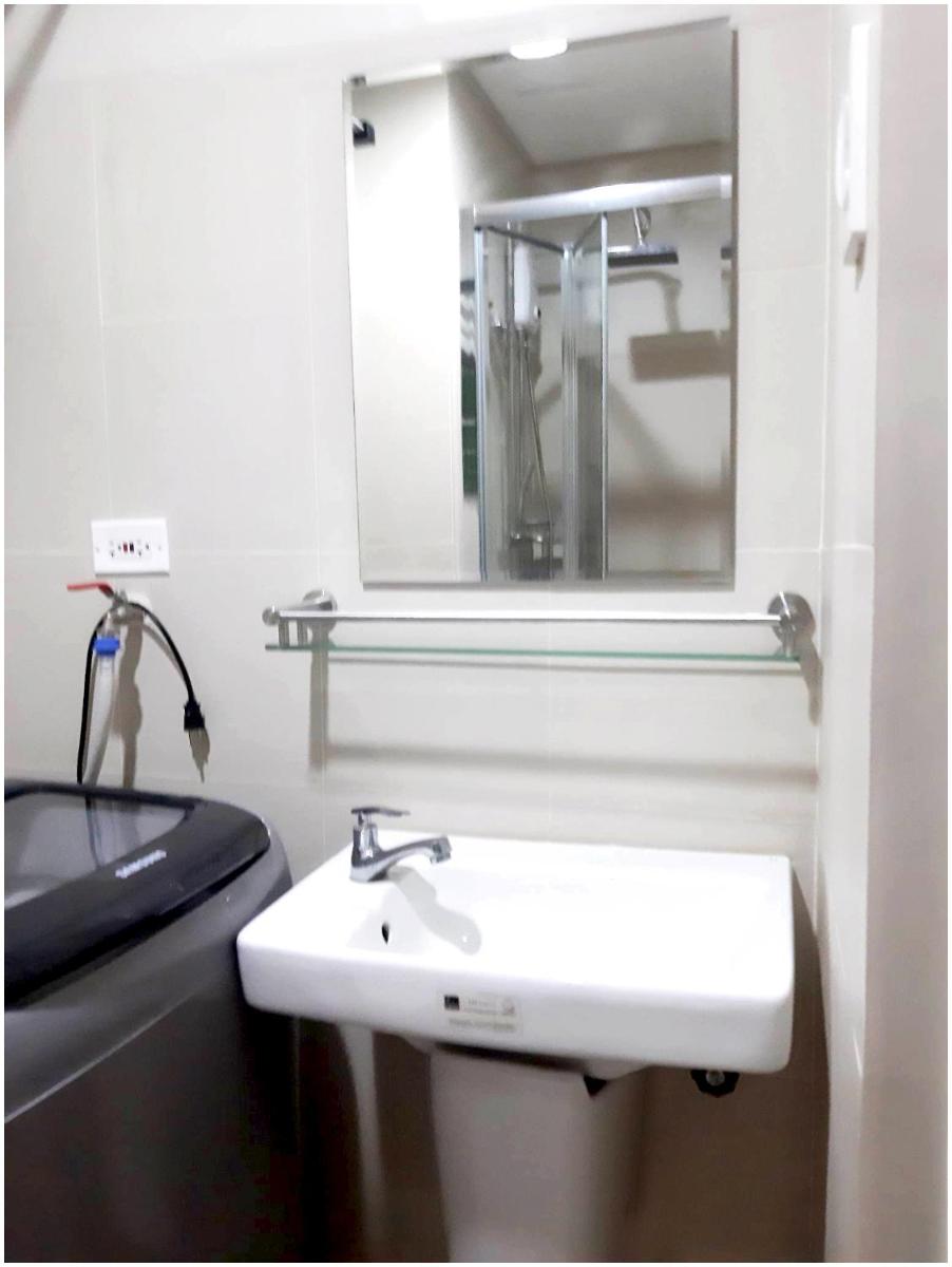 Iona Reign's Vacation Unit at FAME Residences - Housity