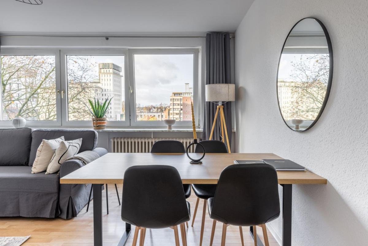 Suitetrails - Modernes und Zentralgelegenes Apartment mit Küche, Netflix, und Balkon