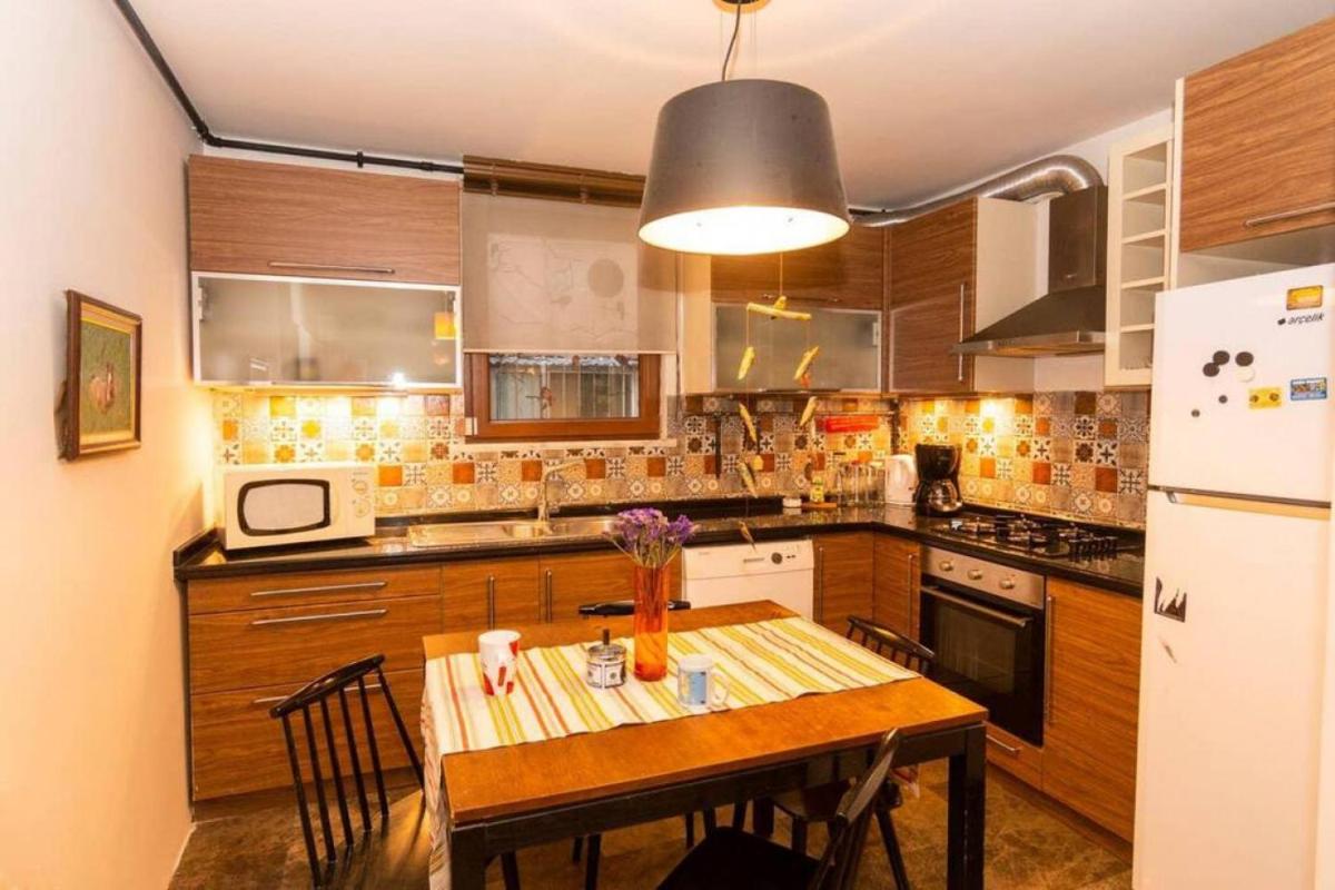 Stylish Home with a Book Collection in Sisli - Housity
