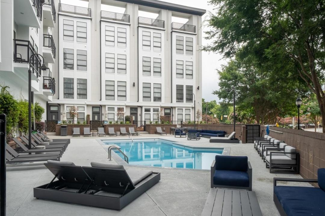 Uptown Gem Spacious Condo With Parking-WiFi-10 min walk to Spectrum Center - Housity