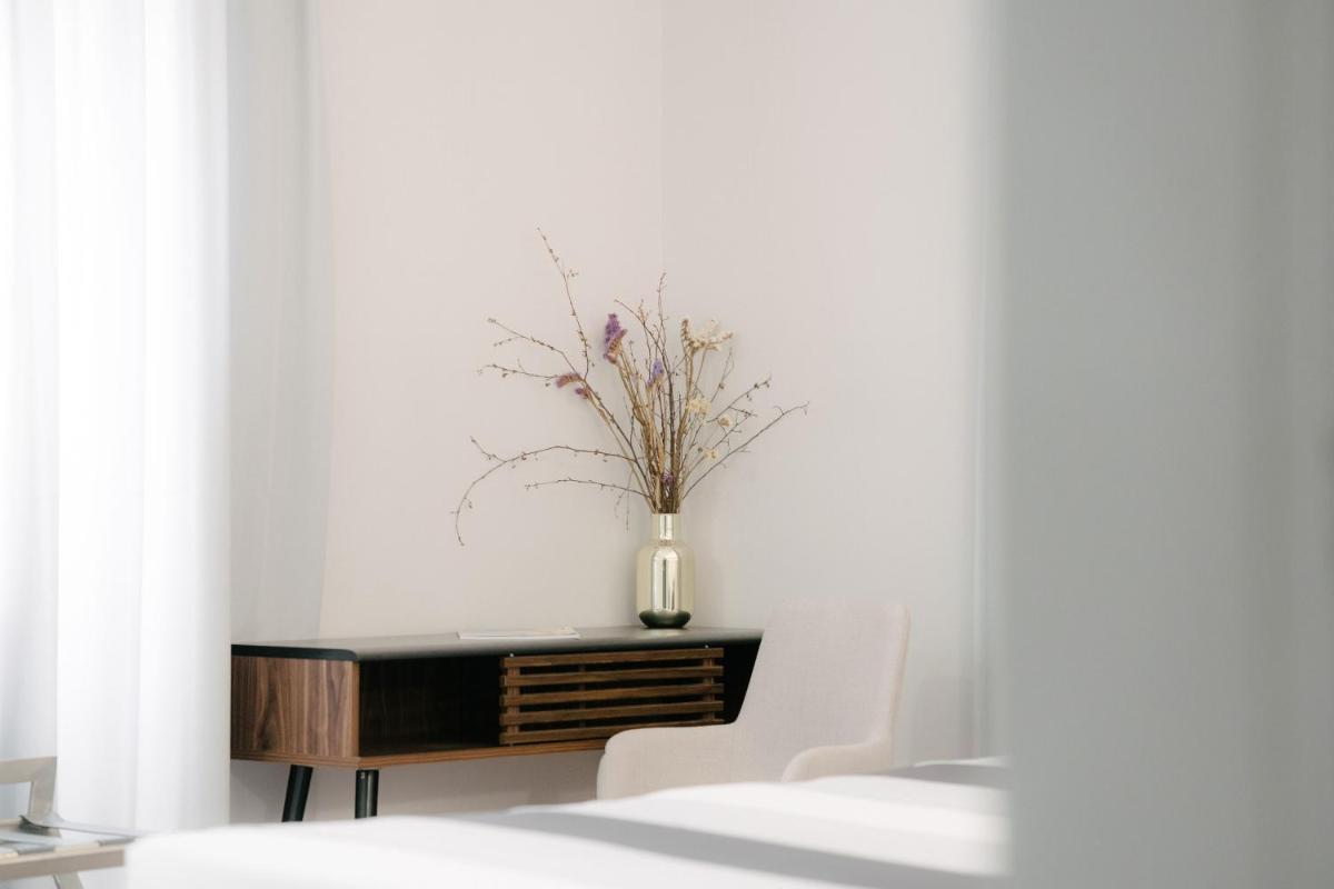 Uma cama ou camas num quarto em Sé Boutique Hotel