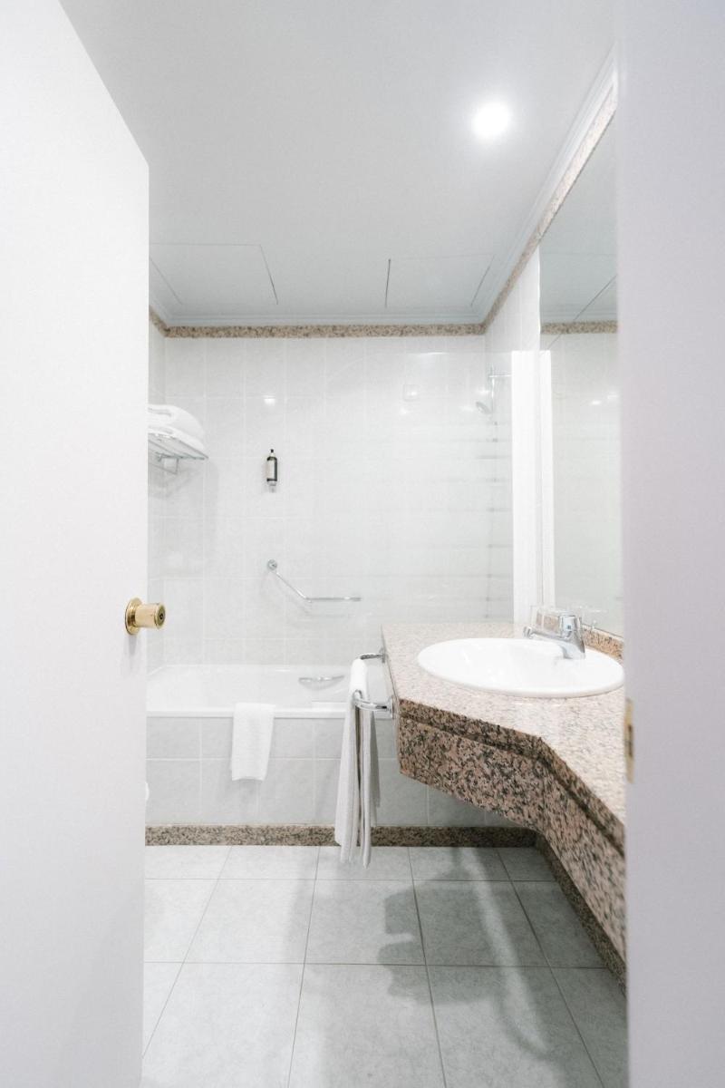 Uma casa de banho em Sé Boutique Hotel