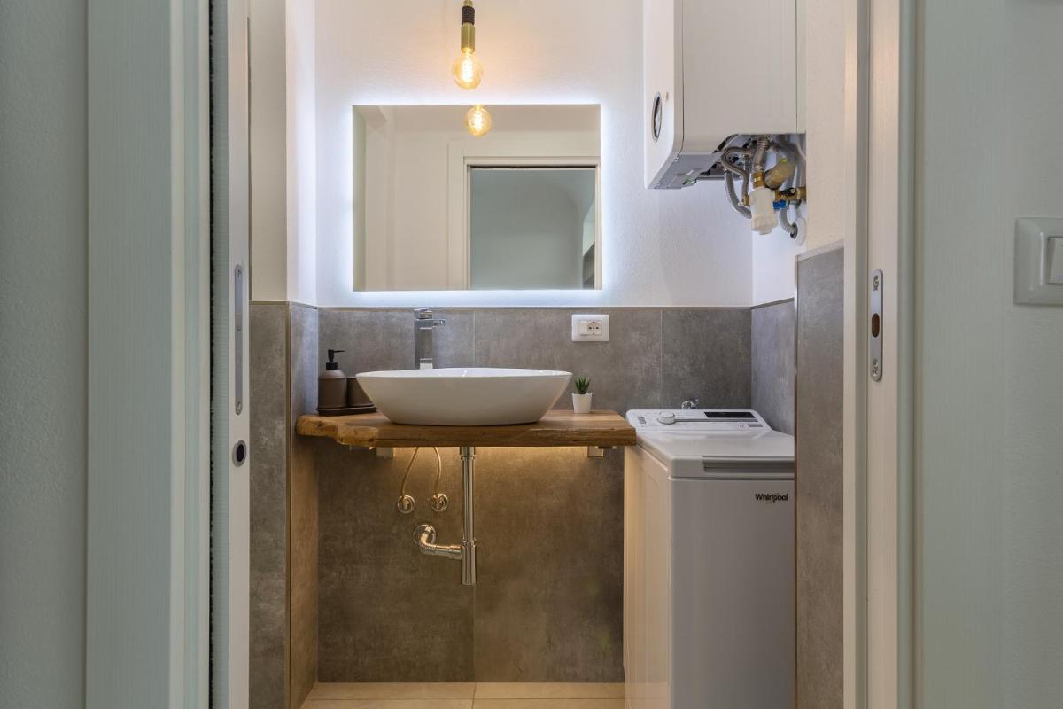GuestHost - Casa Melo Mini House - Housity