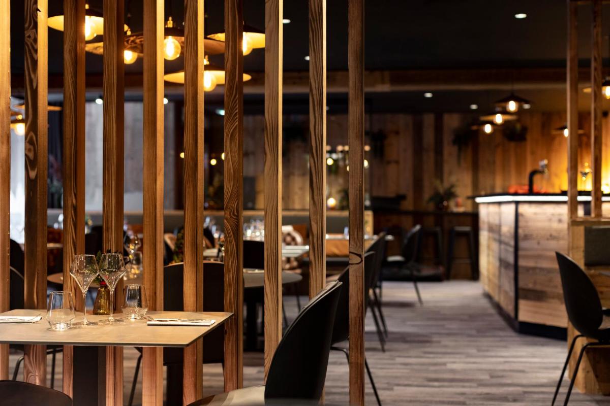 Restaurant ou autre lieu de restauration dans l'établissement Hôtel et Spa Le Vermont