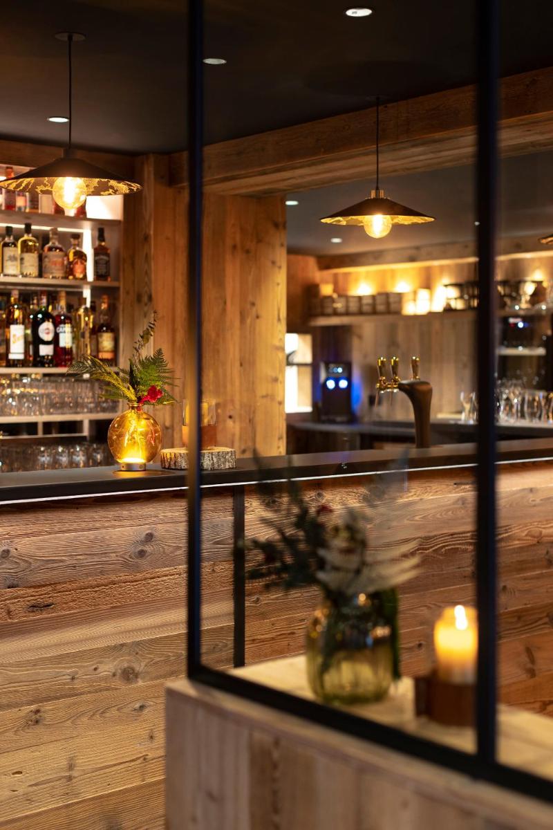 Salon ou bar de l'établissement Hôtel et Spa Le Vermont