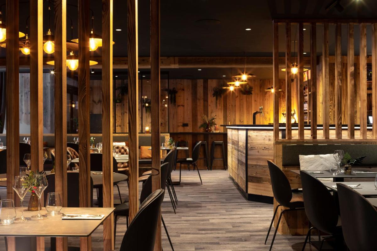 Restaurant ou autre lieu de restauration dans l'établissement Hôtel et Spa Le Vermont