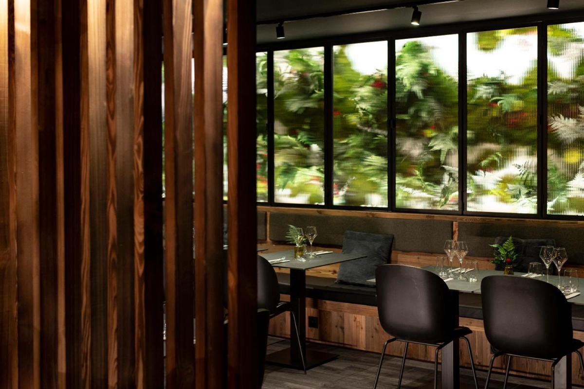 Restaurant ou autre lieu de restauration dans l'établissement Hôtel et Spa Le Vermont