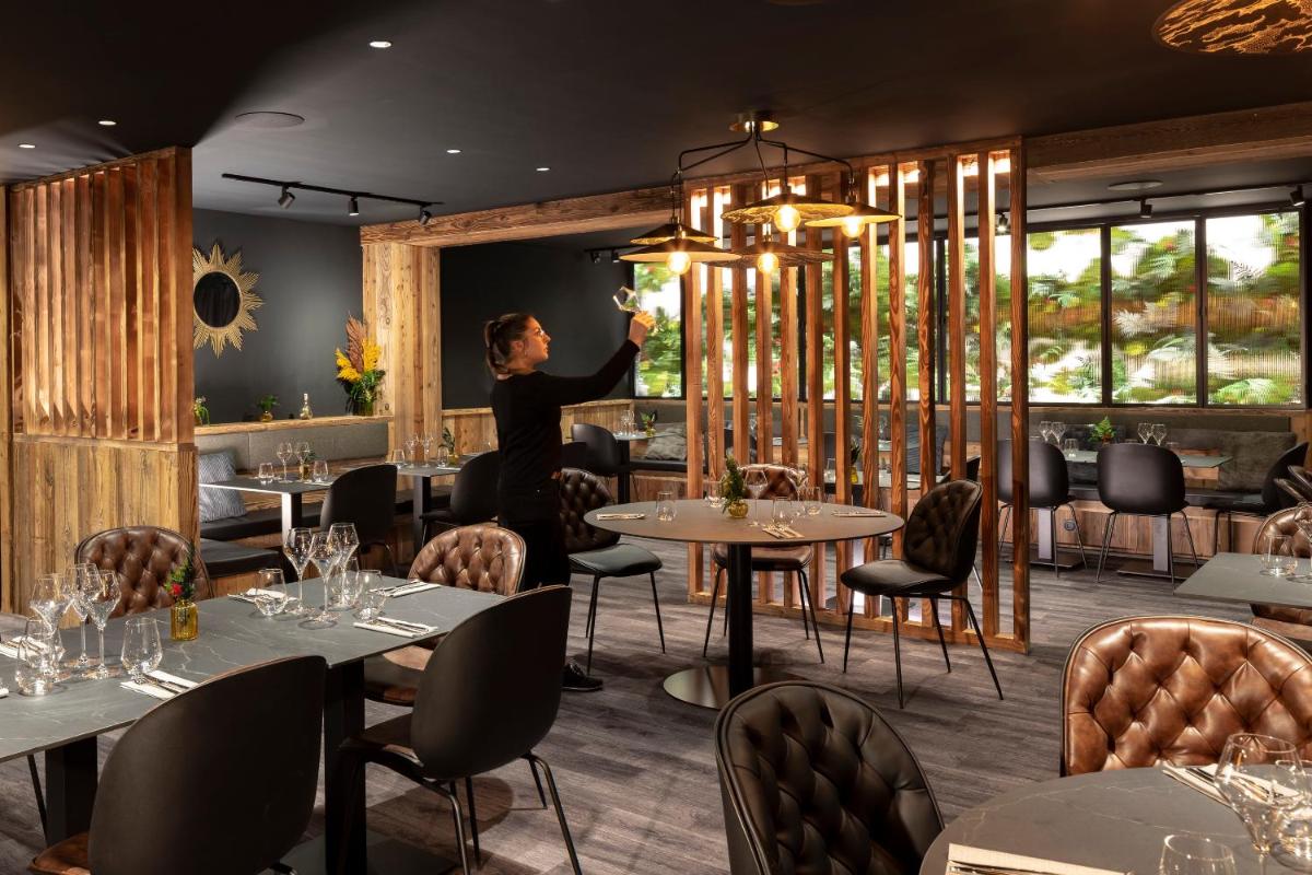 Restaurant ou autre lieu de restauration dans l'établissement Hôtel et Spa Le Vermont