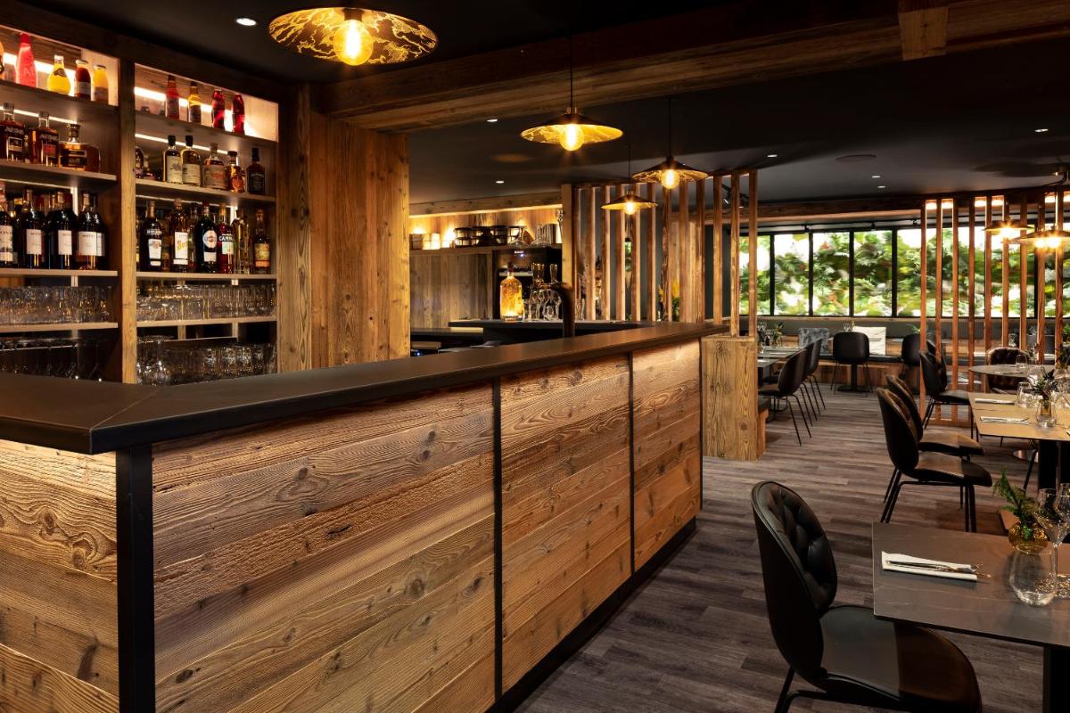 Salon ou bar de l'établissement Hôtel et Spa Le Vermont
