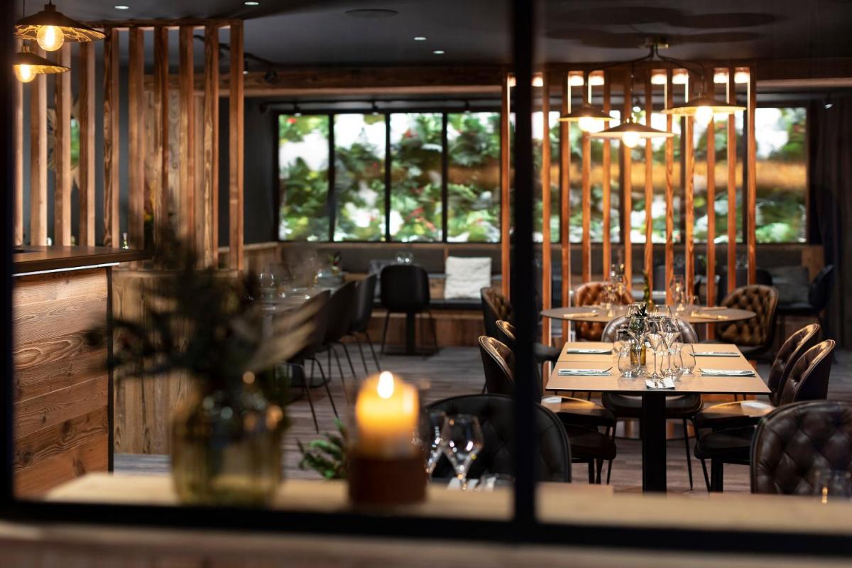 Restaurant ou autre lieu de restauration dans l'établissement Hôtel et Spa Le Vermont