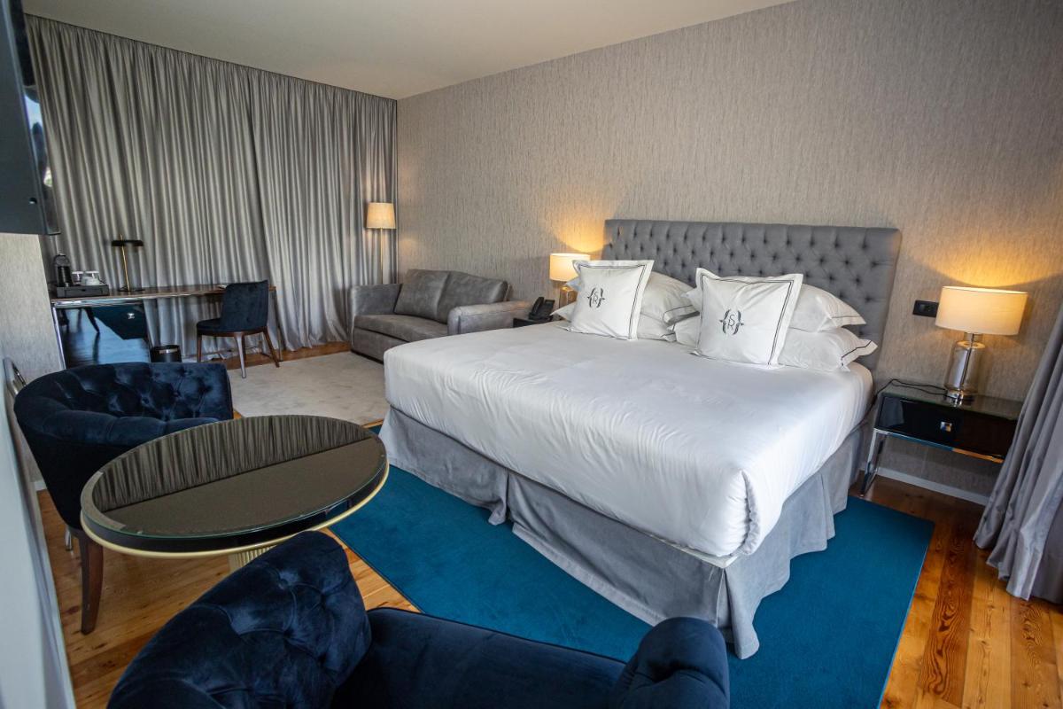 Uma cama ou camas num quarto em Solar do Requeijo by Luna Hotels & Resorts