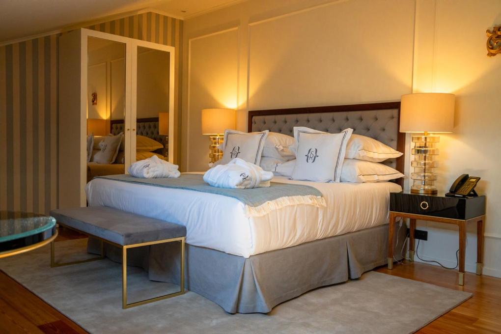 Uma cama ou camas num quarto em Solar do Requeijo by Luna Hotels & Resorts