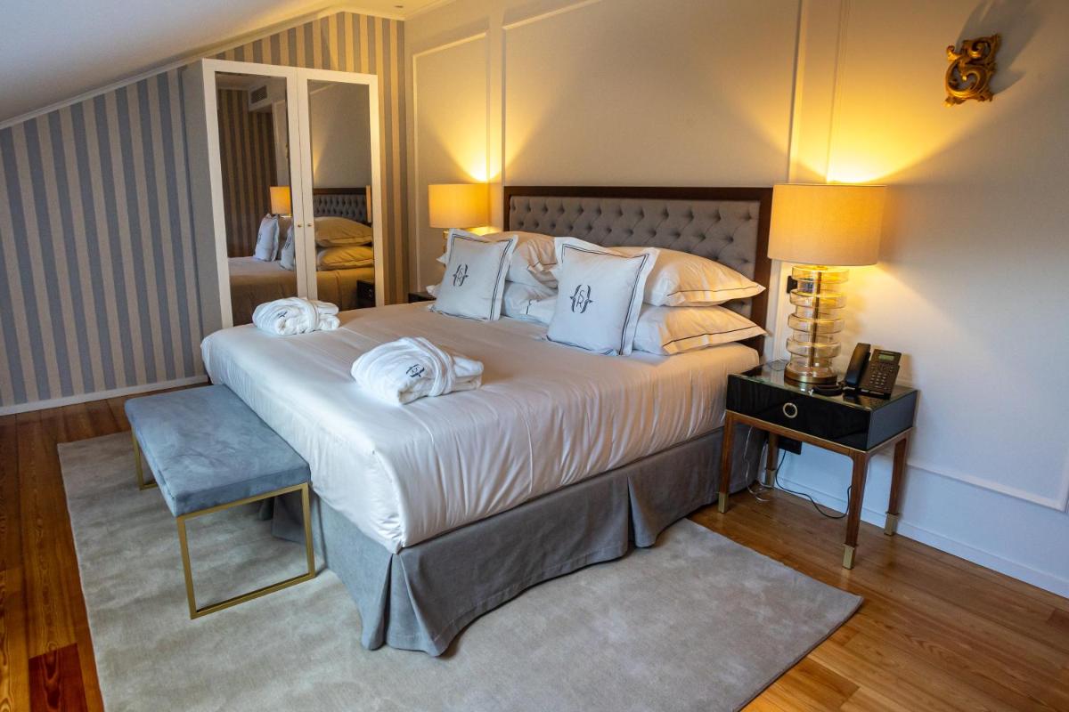 Uma cama ou camas num quarto em Solar do Requeijo by Luna Hotels & Resorts