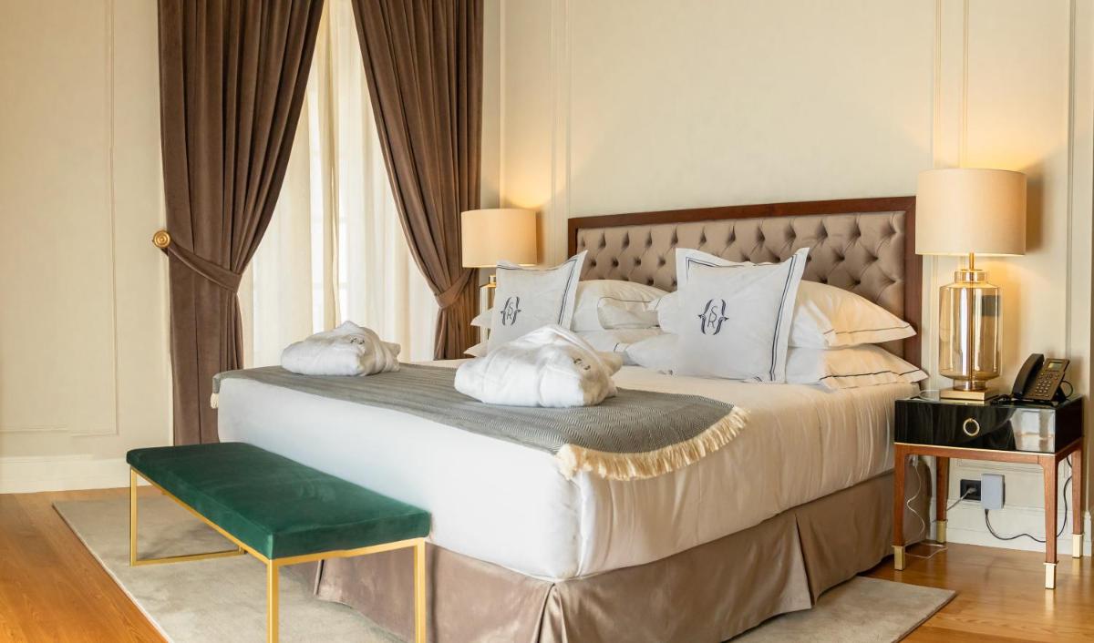 Uma cama ou camas num quarto em Solar do Requeijo by Luna Hotels & Resorts
