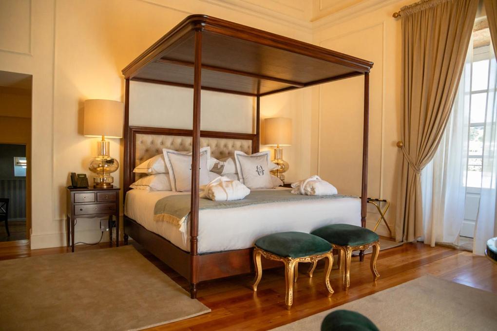 Uma cama ou camas num quarto em Solar do Requeijo by Luna Hotels & Resorts