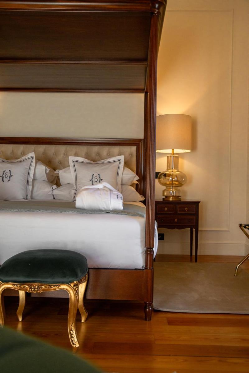 Uma cama ou camas num quarto em Solar do Requeijo by Luna Hotels & Resorts