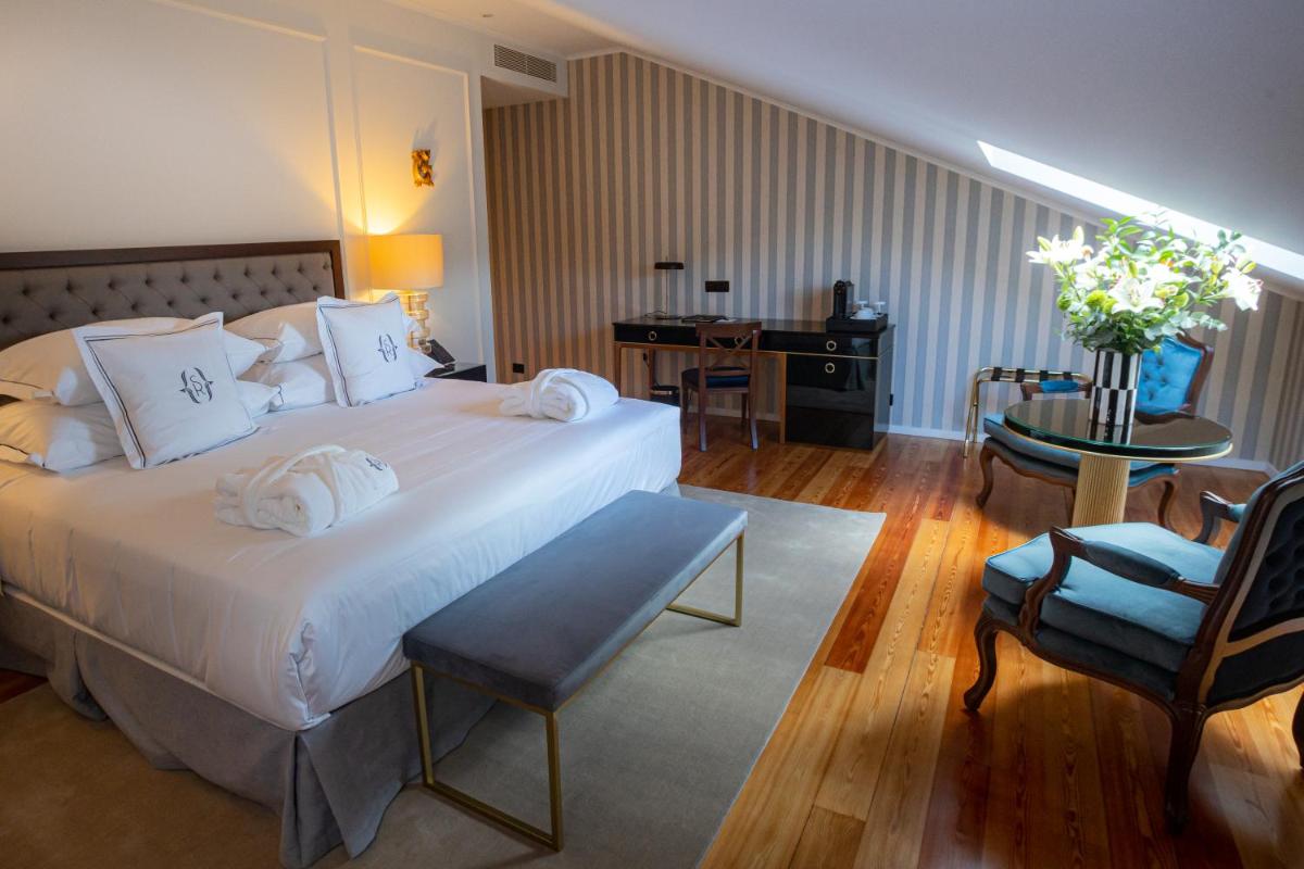 Uma cama ou camas num quarto em Solar do Requeijo by Luna Hotels & Resorts