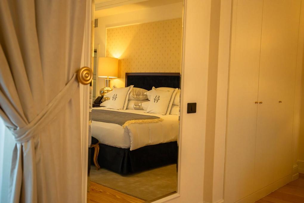 Uma cama ou camas num quarto em Solar do Requeijo by Luna Hotels & Resorts