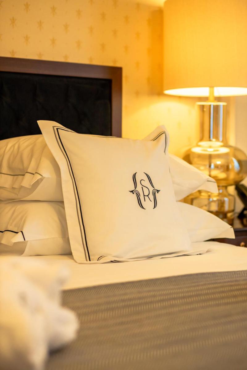 Uma cama ou camas num quarto em Solar do Requeijo by Luna Hotels & Resorts