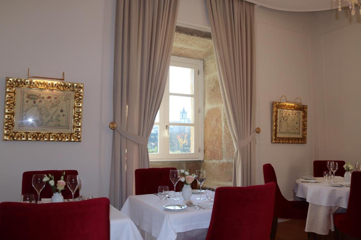Um restaurante ou outro lugar para comer em Solar do Requeijo by Luna Hotels & Resorts