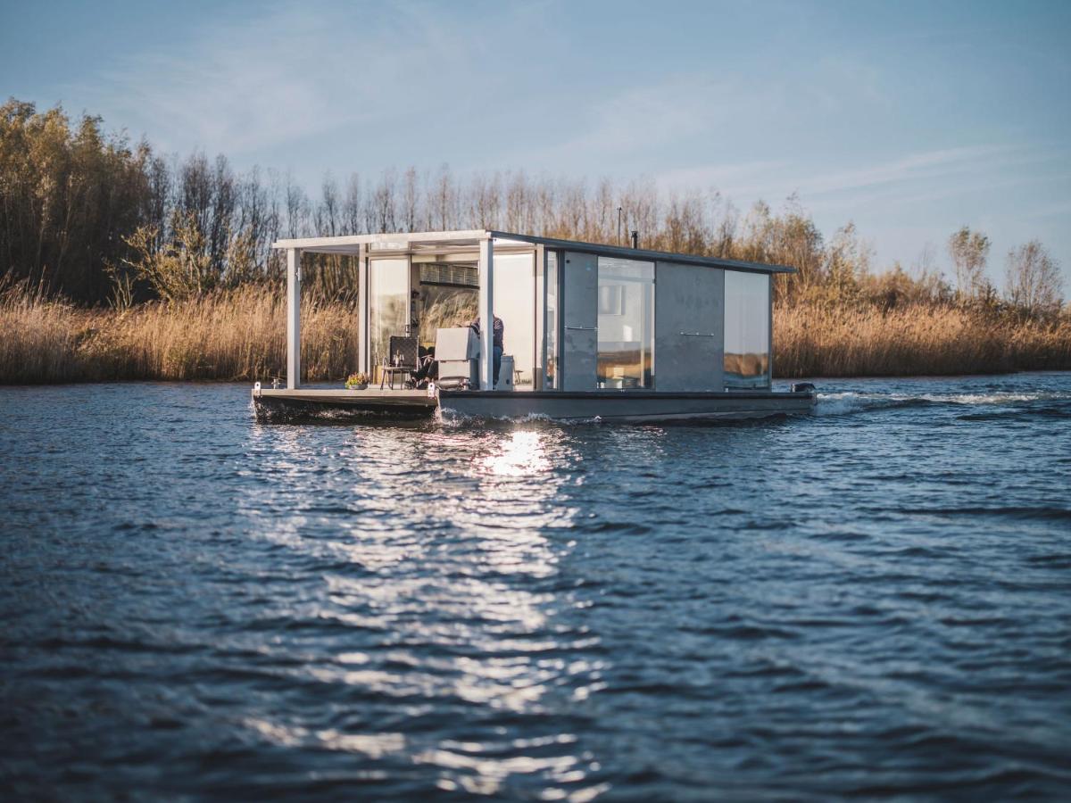 AquaHome - NP de Biesbosch - Bijzonder overnachten op een houseboat! - Housity