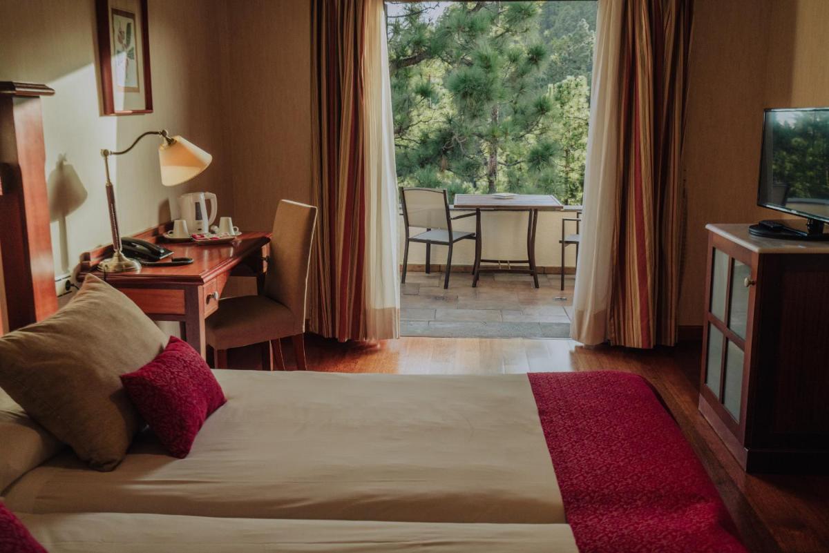 Cama o camas de una habitación en Hotel Spa Villalba
