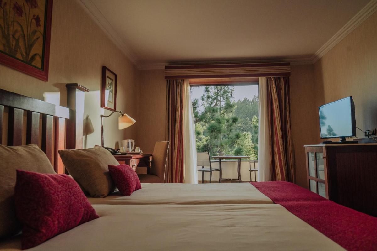 Cama o camas de una habitación en Hotel Spa Villalba