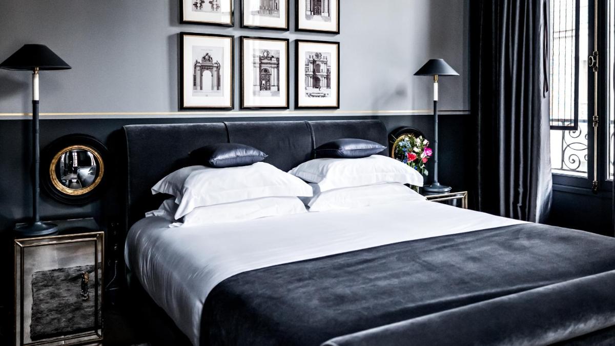 Un ou plusieurs lits dans un hébergement de l'établissement Monsieur George Hotel & Spa - Champs-Elysées